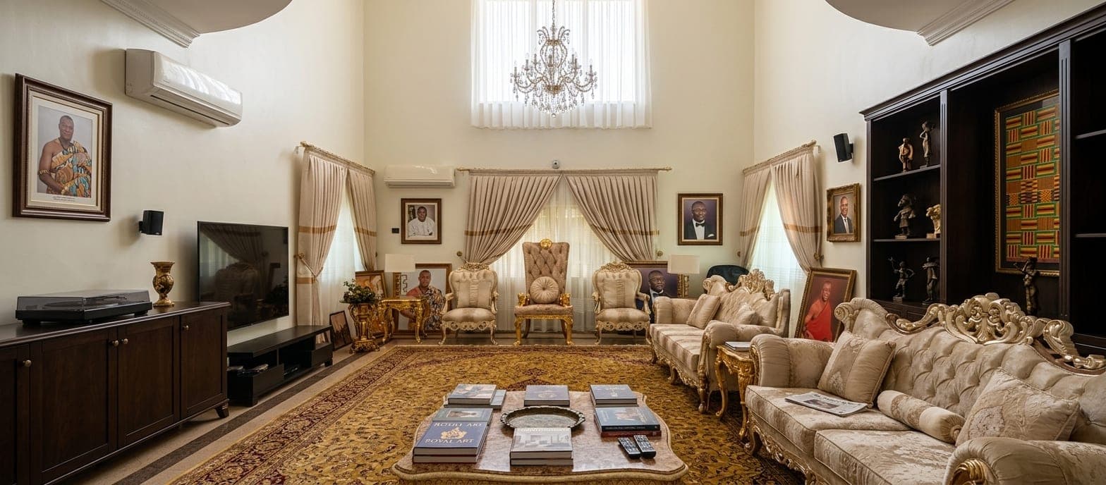 Pinch-pleat curtains and sheers across the windows of a double-height living room